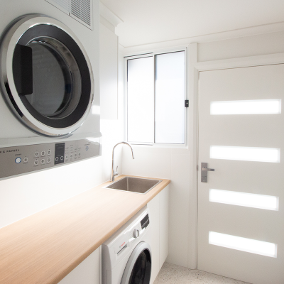 8 Renovated laundry with washer under the sink