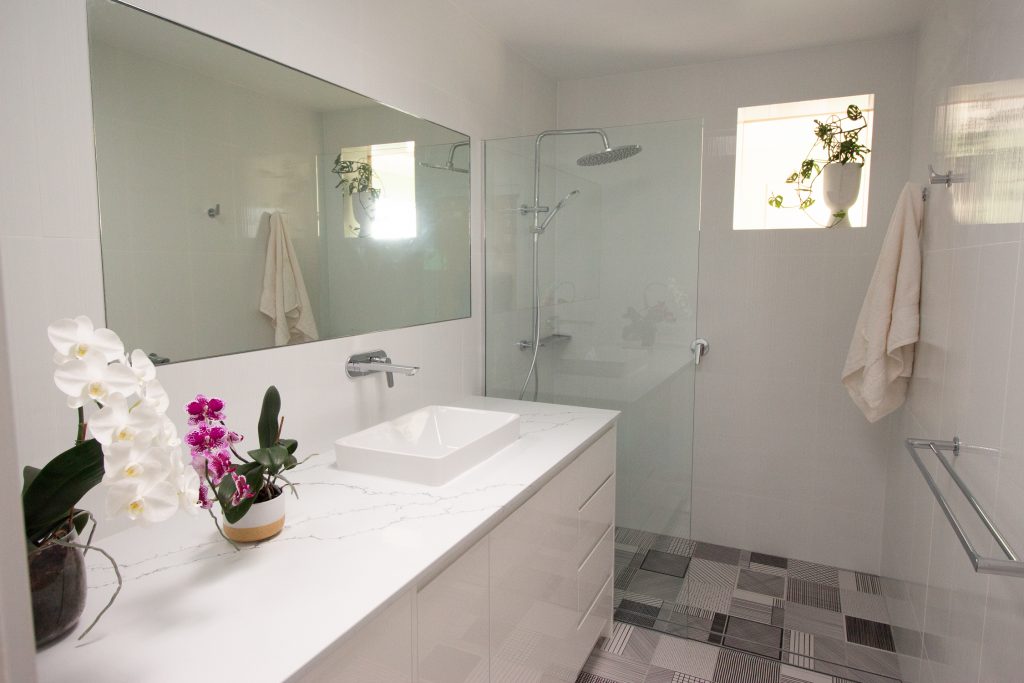Bathroom with patterned tile floor