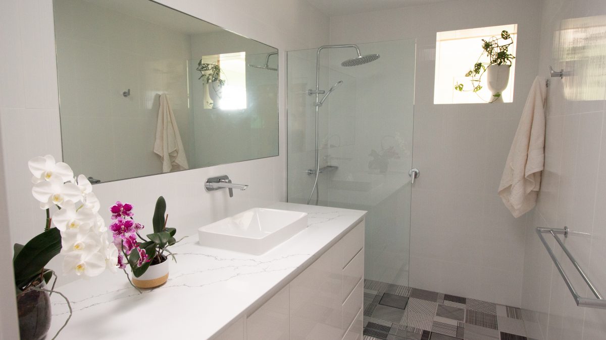 Bathroom with patterned tile floor