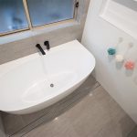 Bathtub on stone tiles